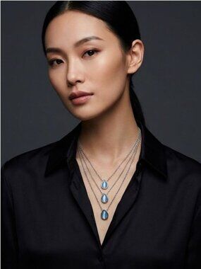 Elegant Layered Silver-Plated Necklace with Blue Teardrop Pendants